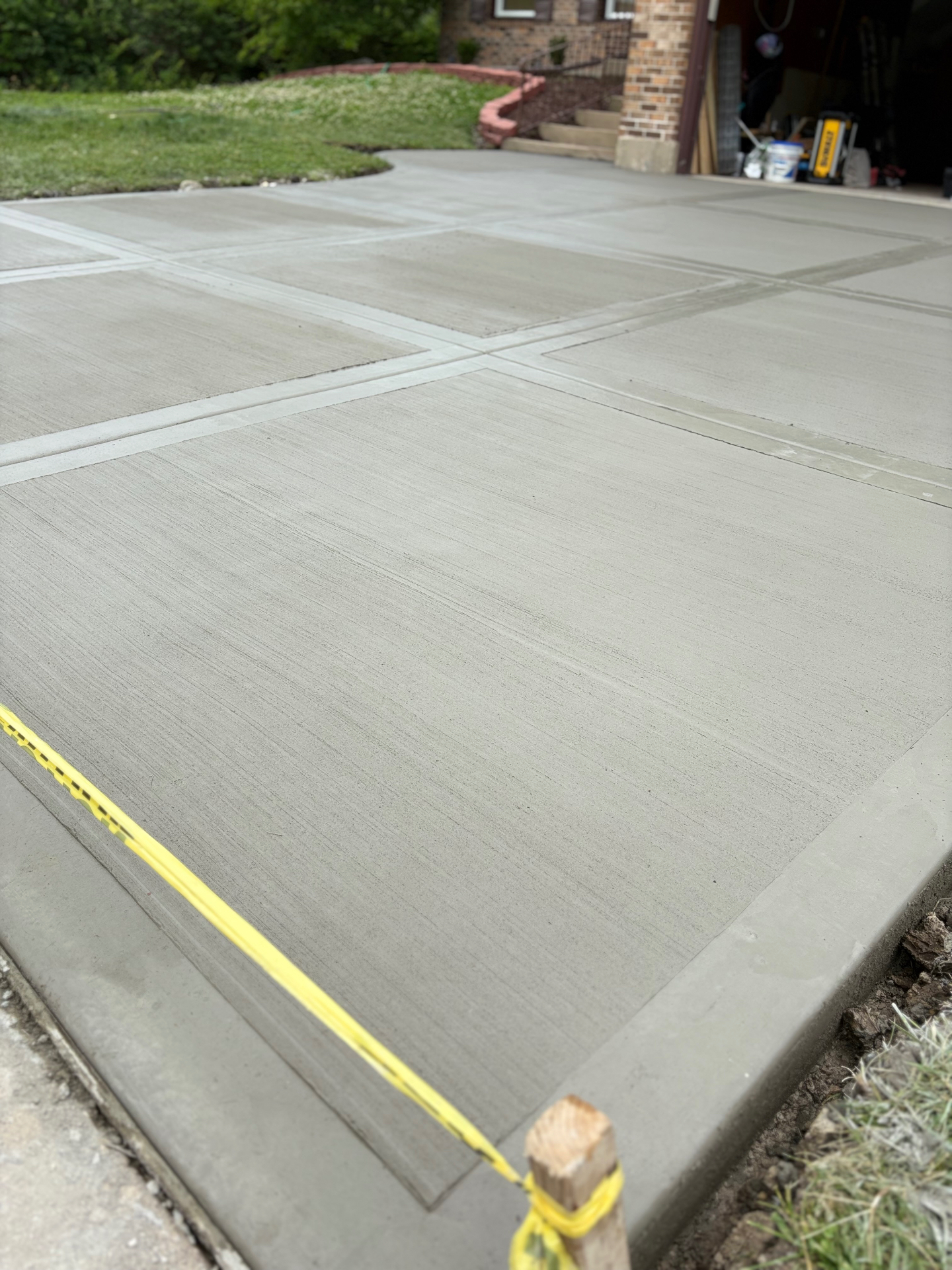 Brushed concrete driveway with grid pattern
