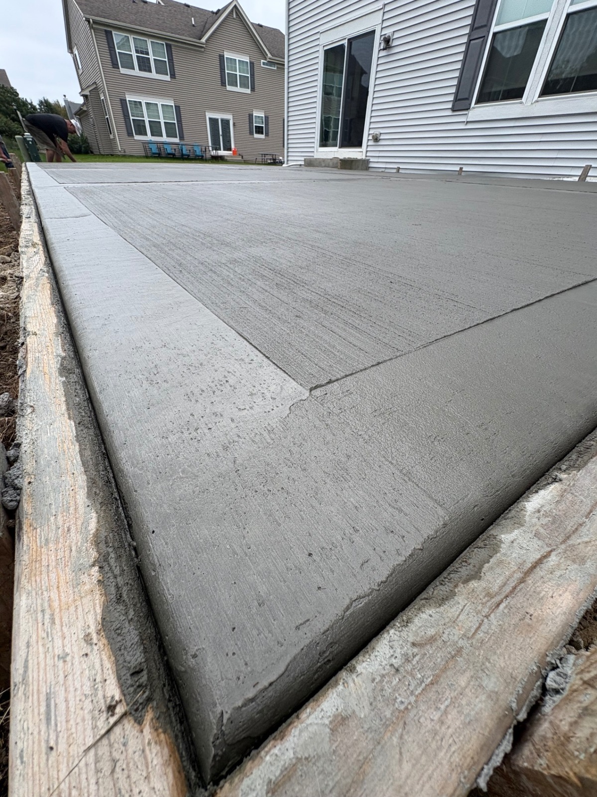 Close-up of brushed concrete patio edge and finish